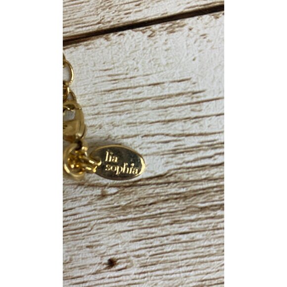 Lia Sophia Gold Tone Backed Shell Pendant Necklace on Adjustable 16” Black Cord - Picture 3 of 7